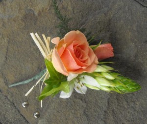 Peach rose star of bethlehem boutonniere