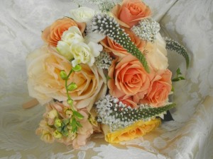 Peach wildflower bridesmaid bouquet