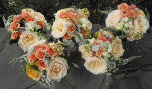 Peach wildflower bridesmaids bouquets