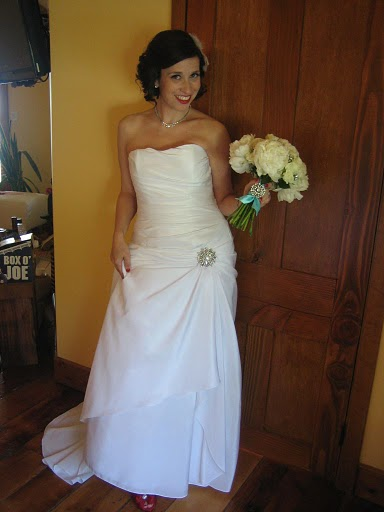 broach bouquet and dress