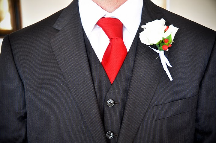 white rose and red tie