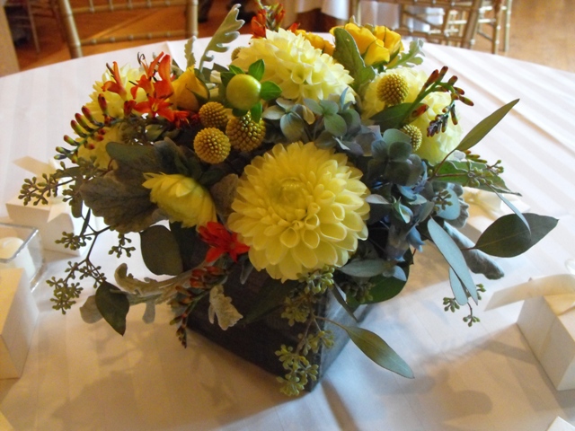 yellow and gray floral centerpiece