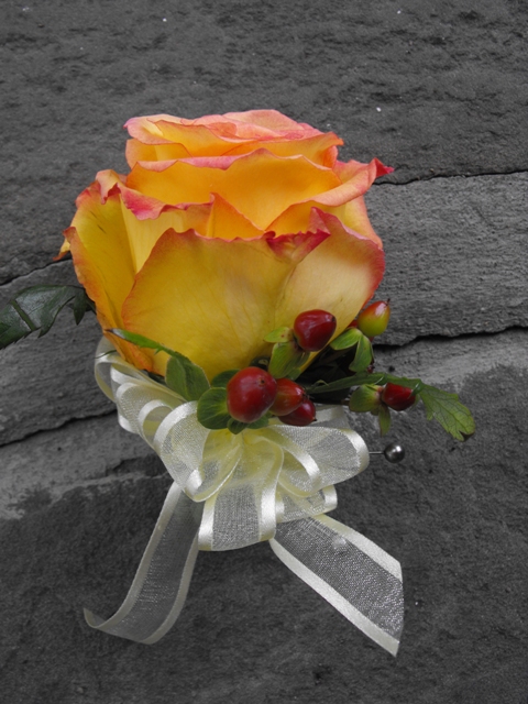 Fall rose pin on corsage
