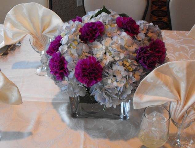 blue hydrangea purple carnation centerpiece