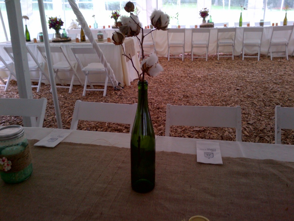 raw cotton in green bottle